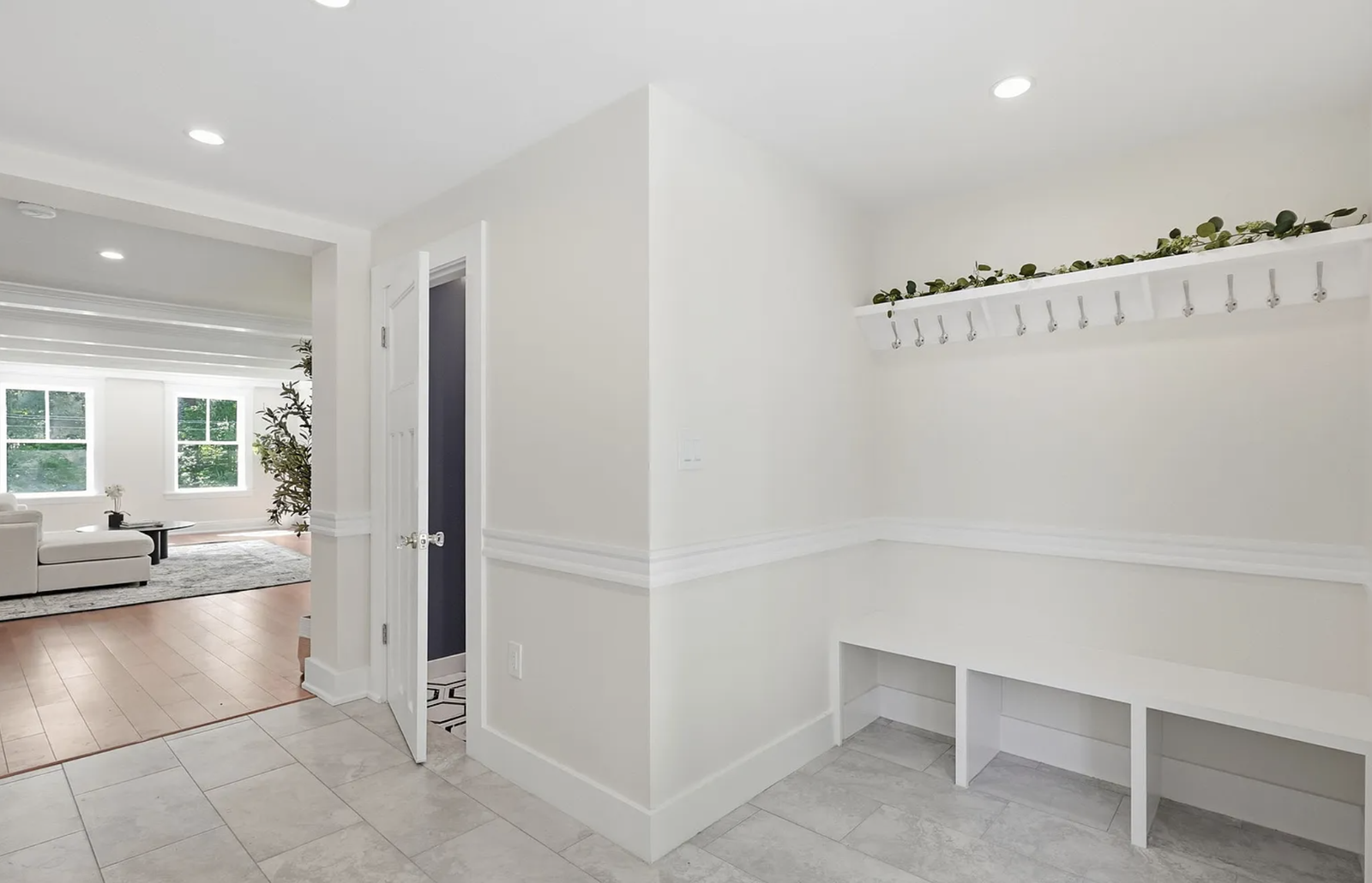 Professionally staged mudroom and built-in storage after renovation in Wayland Massachusetts — view 1