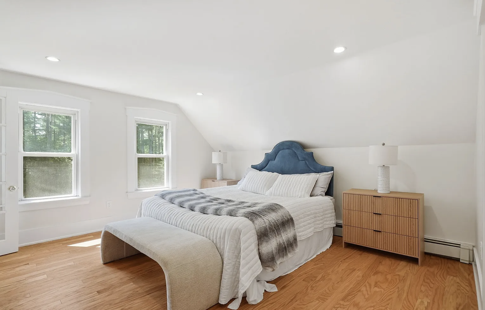 Professionally staged bedroom and upper-floor room after renovation in Wayland Massachusetts — view 3