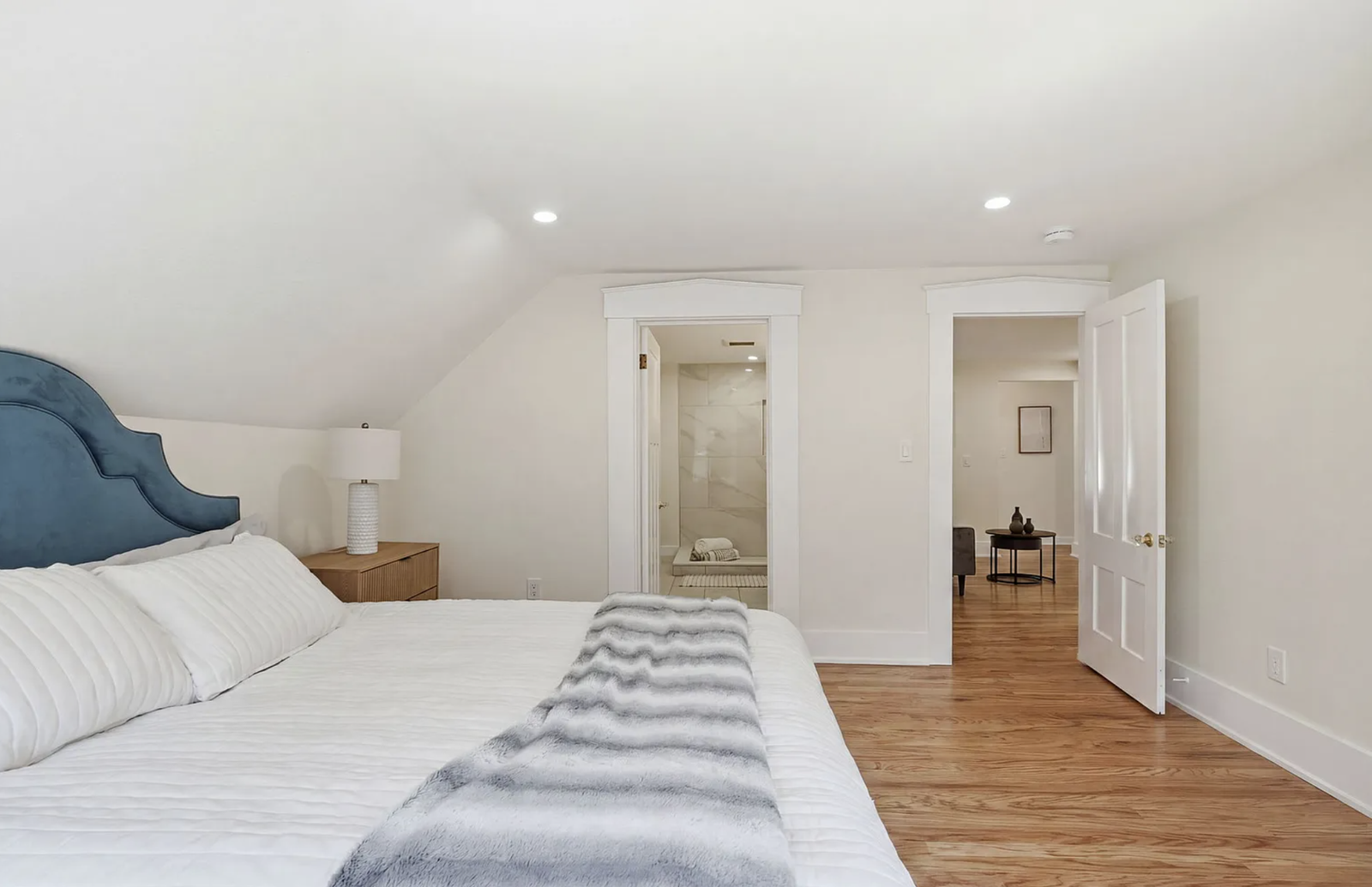 Professionally staged bedroom and upper-floor room after renovation in Wayland Massachusetts — view 4