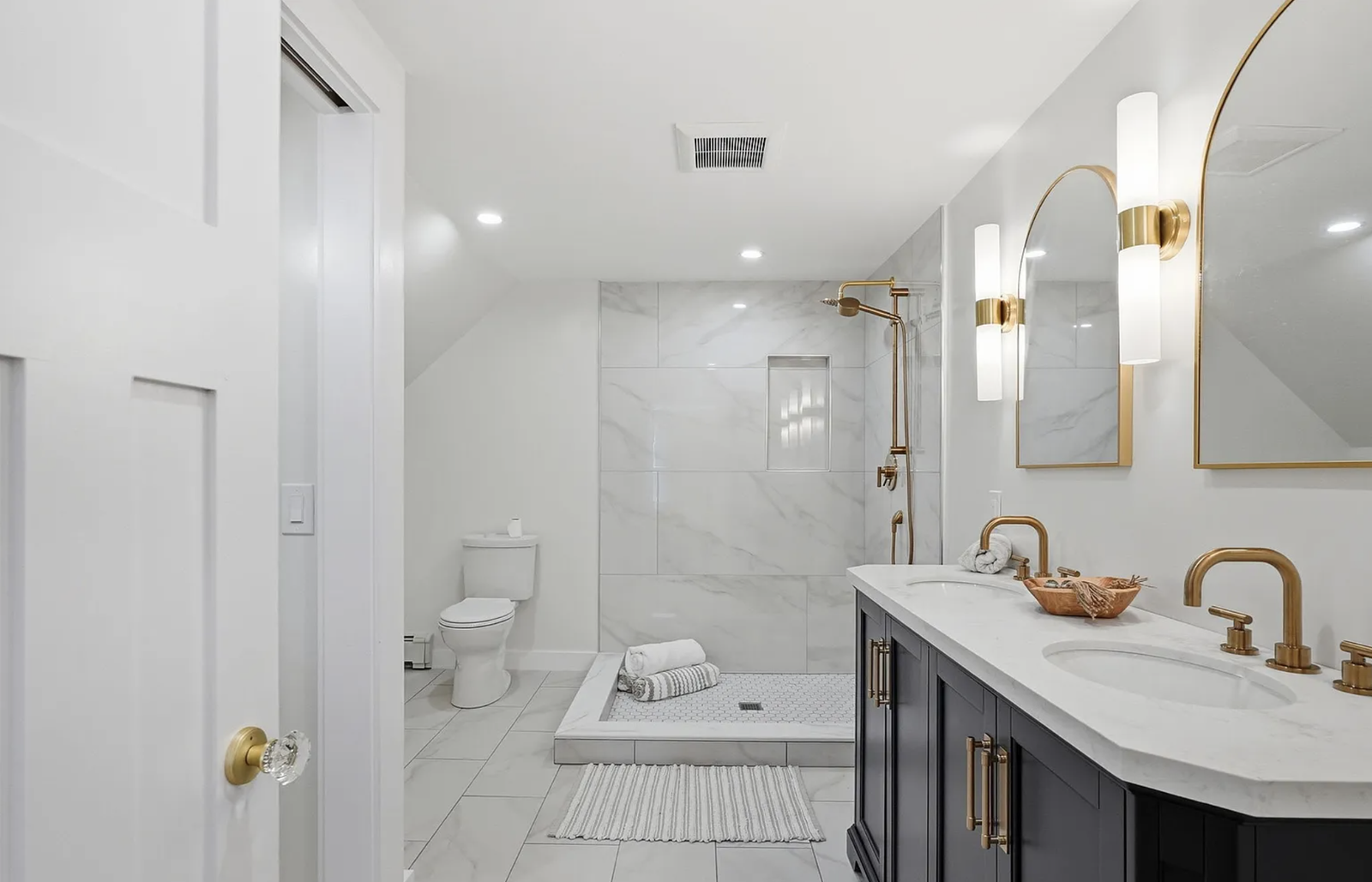 Professionally staged finished bathroom after whole-house renovation in Wayland Massachusetts