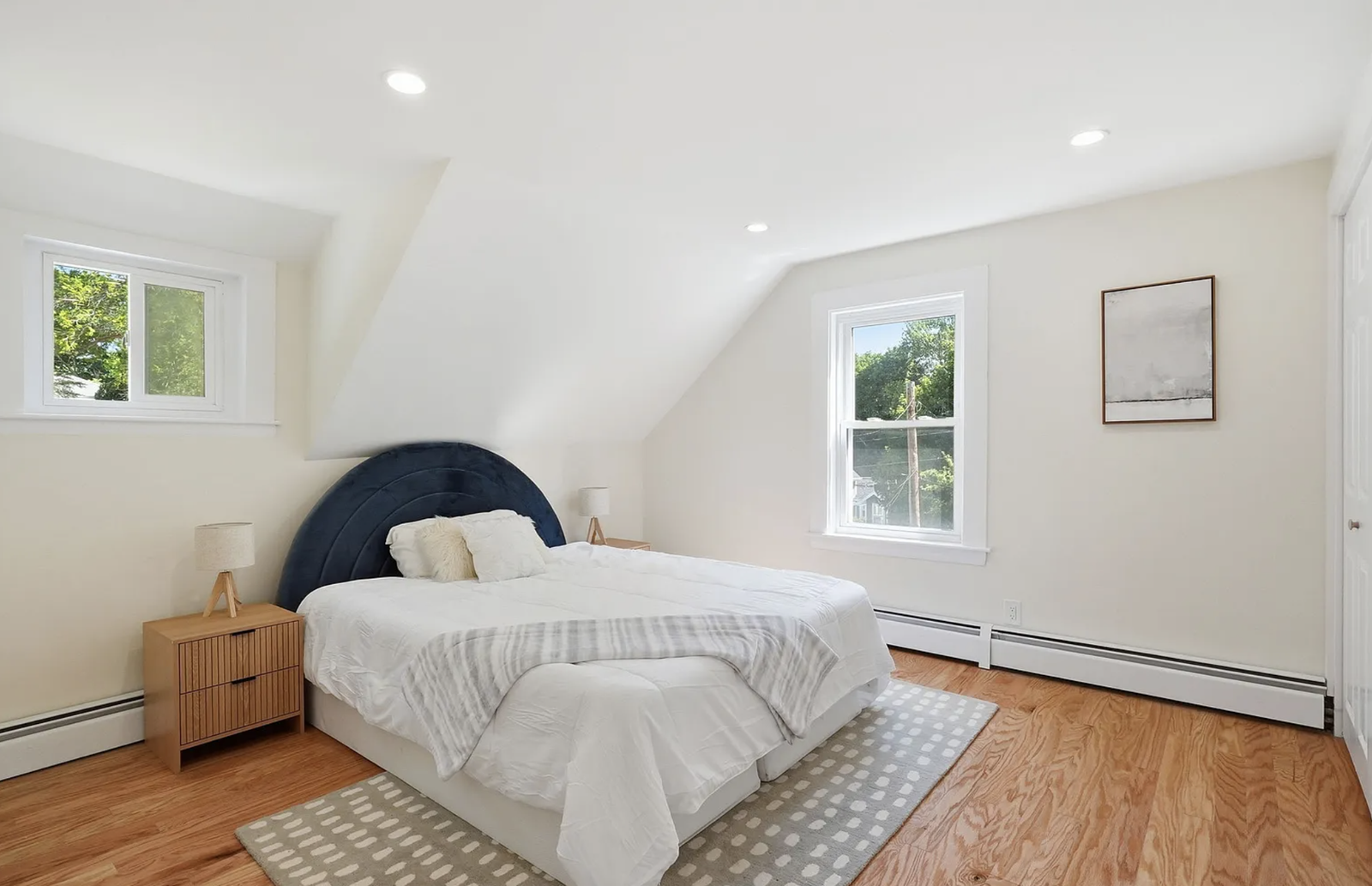 Professionally staged bedroom and upper-floor room after renovation in Wayland Massachusetts — view 5
