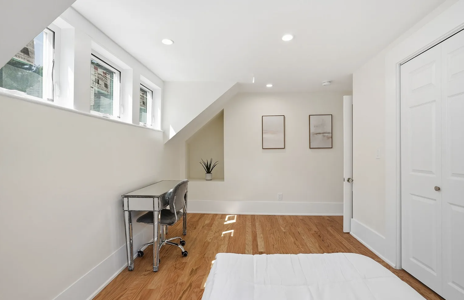Professionally staged bedroom and upper-floor room after renovation in Wayland Massachusetts — view 7