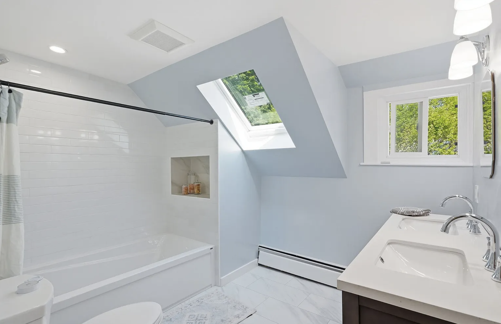 Professionally staged finished bathroom after whole-house renovation in Wayland Massachusetts — view 6