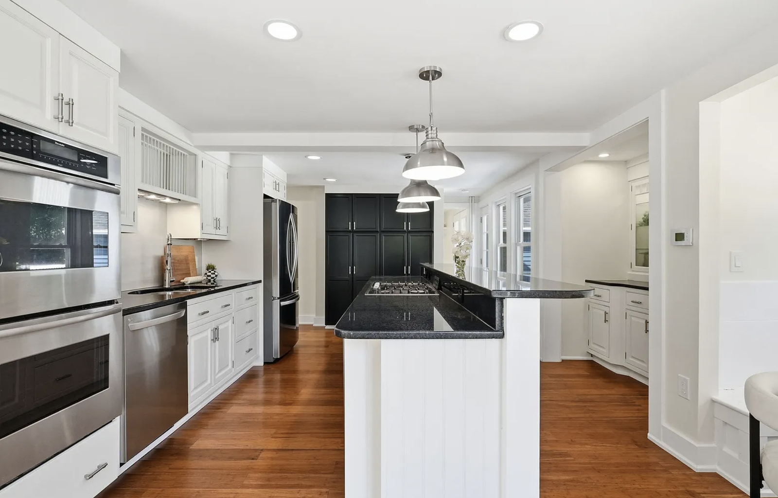 Professionally staged finished kitchen after whole-house renovation in Wayland Massachusetts — view 2