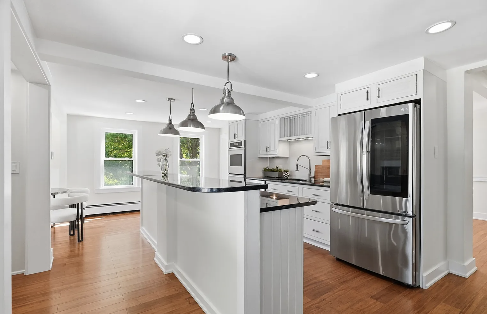 Professionally staged finished kitchen after whole-house renovation in Wayland Massachusetts — view 3