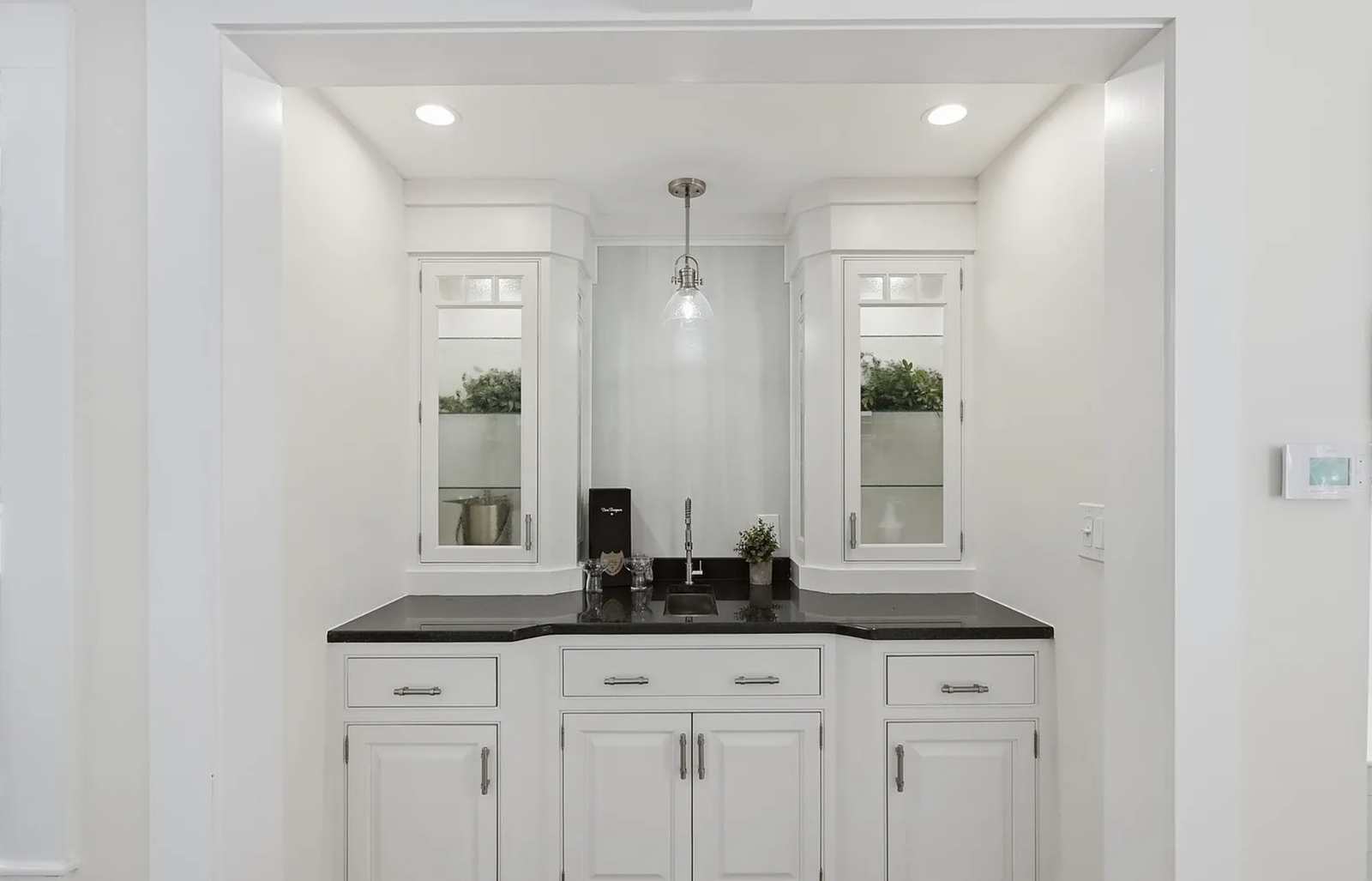 Professionally staged finished kitchen after whole-house renovation in Wayland Massachusetts — view 4