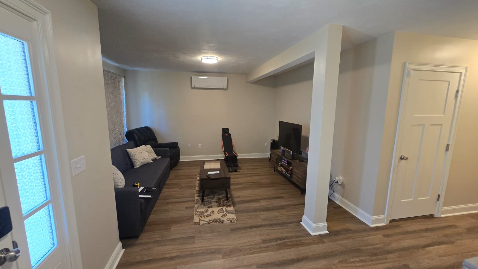 Open interior area before guest bedroom conversion in Wilmington Massachusetts