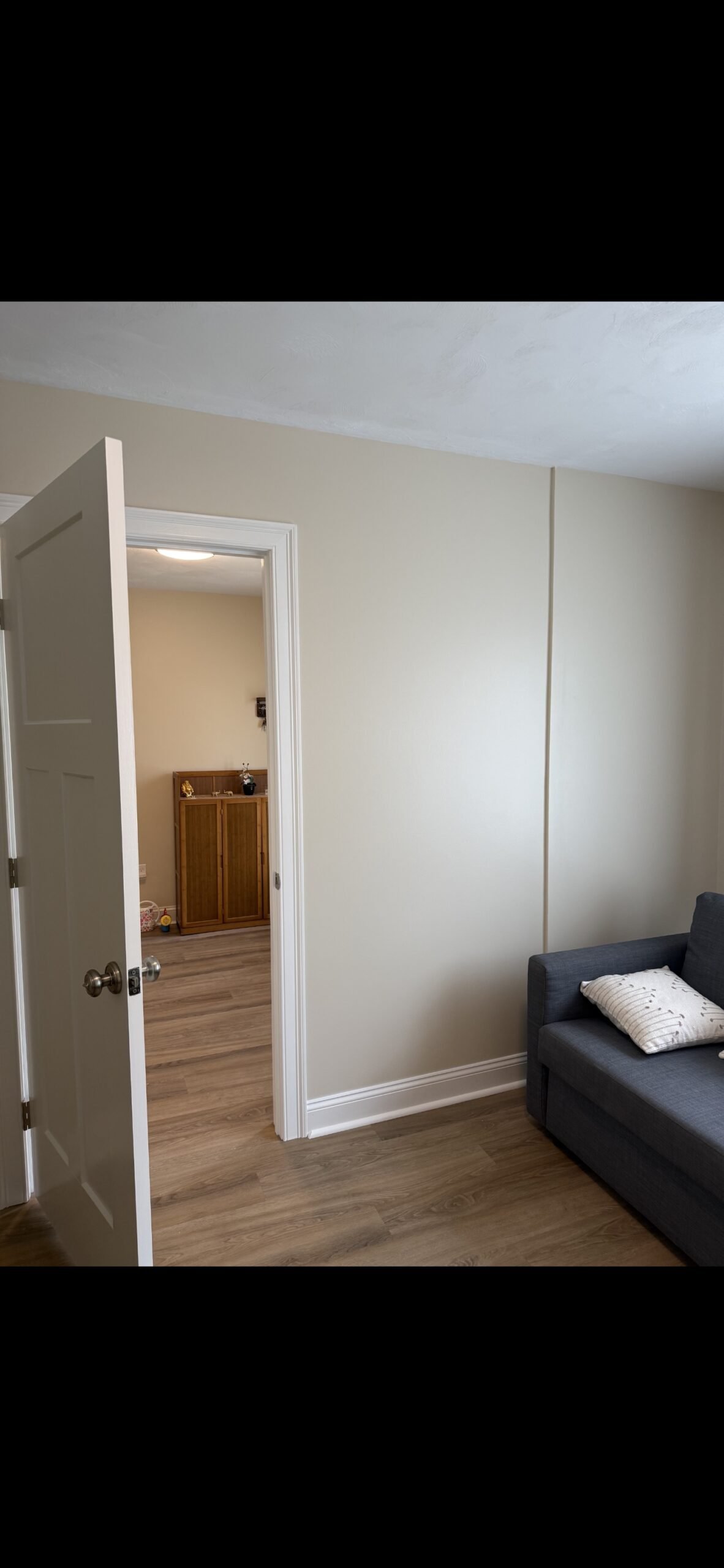 Finished guest bedroom and seamless doorway integration in Wilmington Massachusetts
