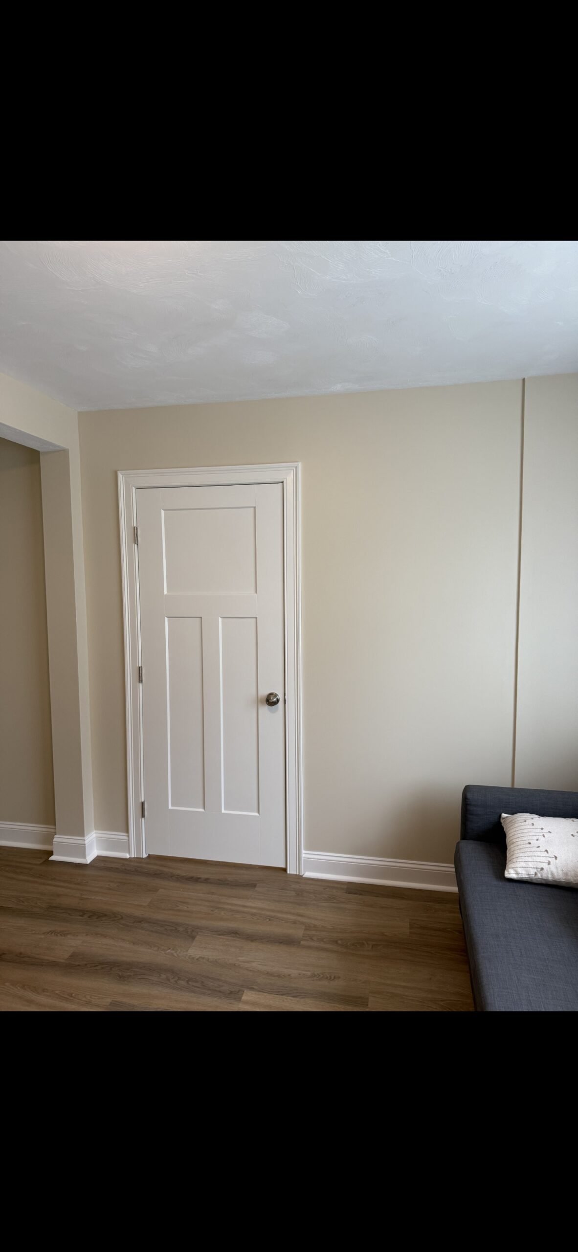 Completed guest bedroom conversion viewed from adjoining room in Wilmington