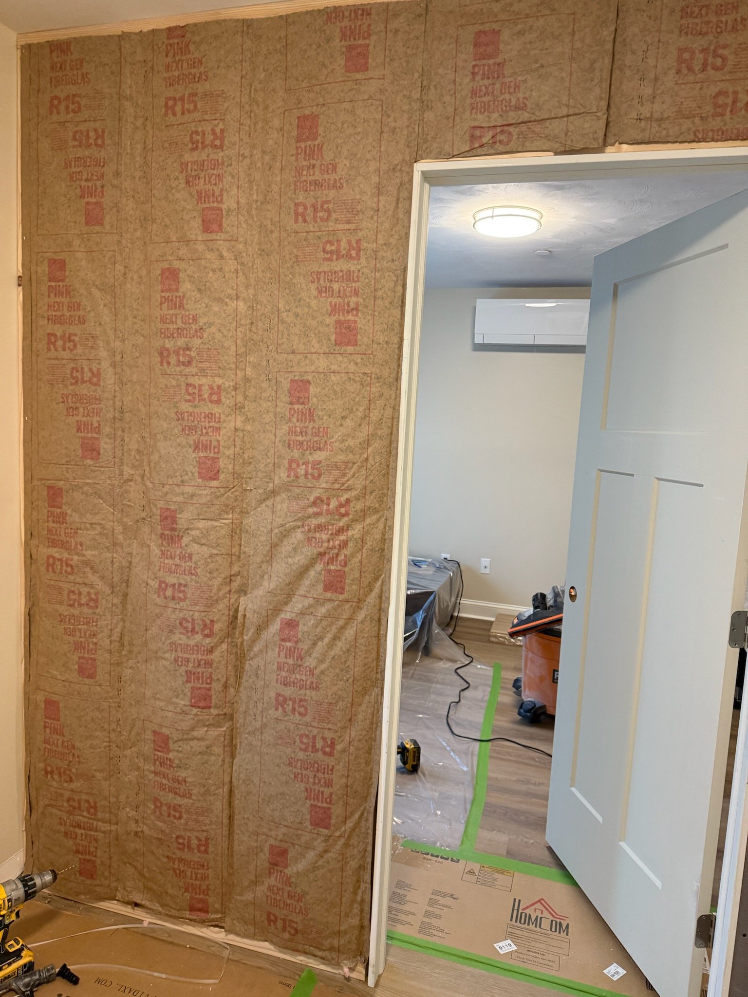 Insulation and wall construction during Wilmington room conversion