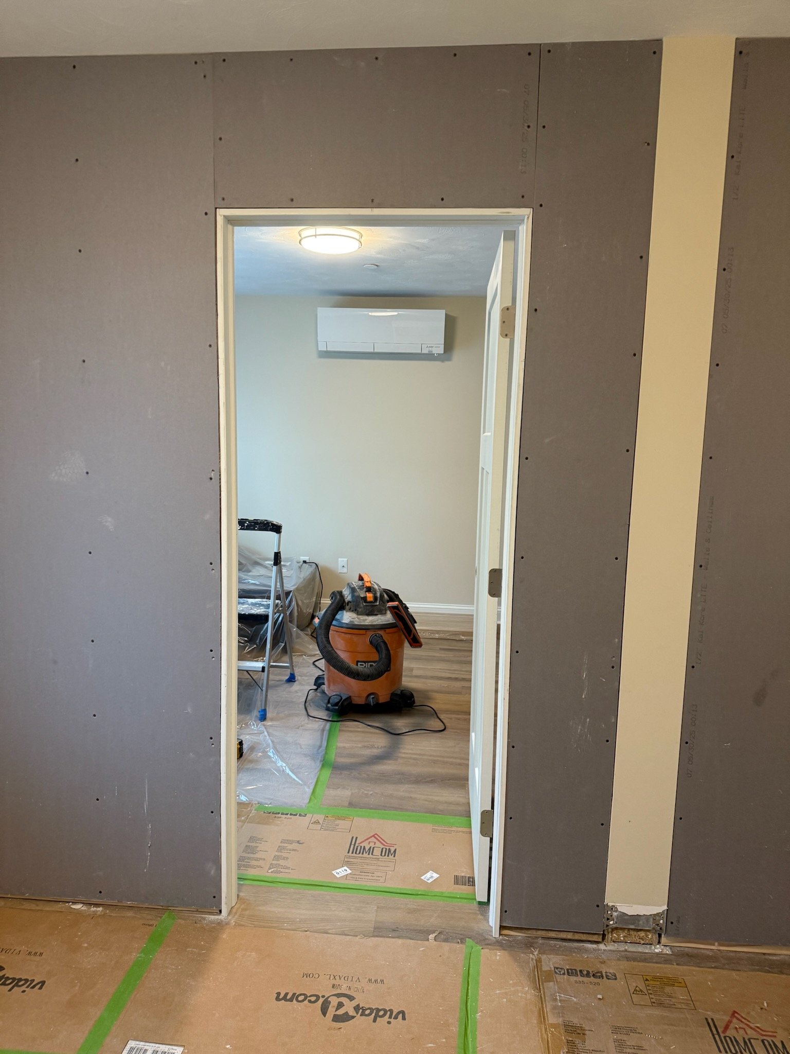 Drywall trim and finish preparation during Wilmington interior renovation