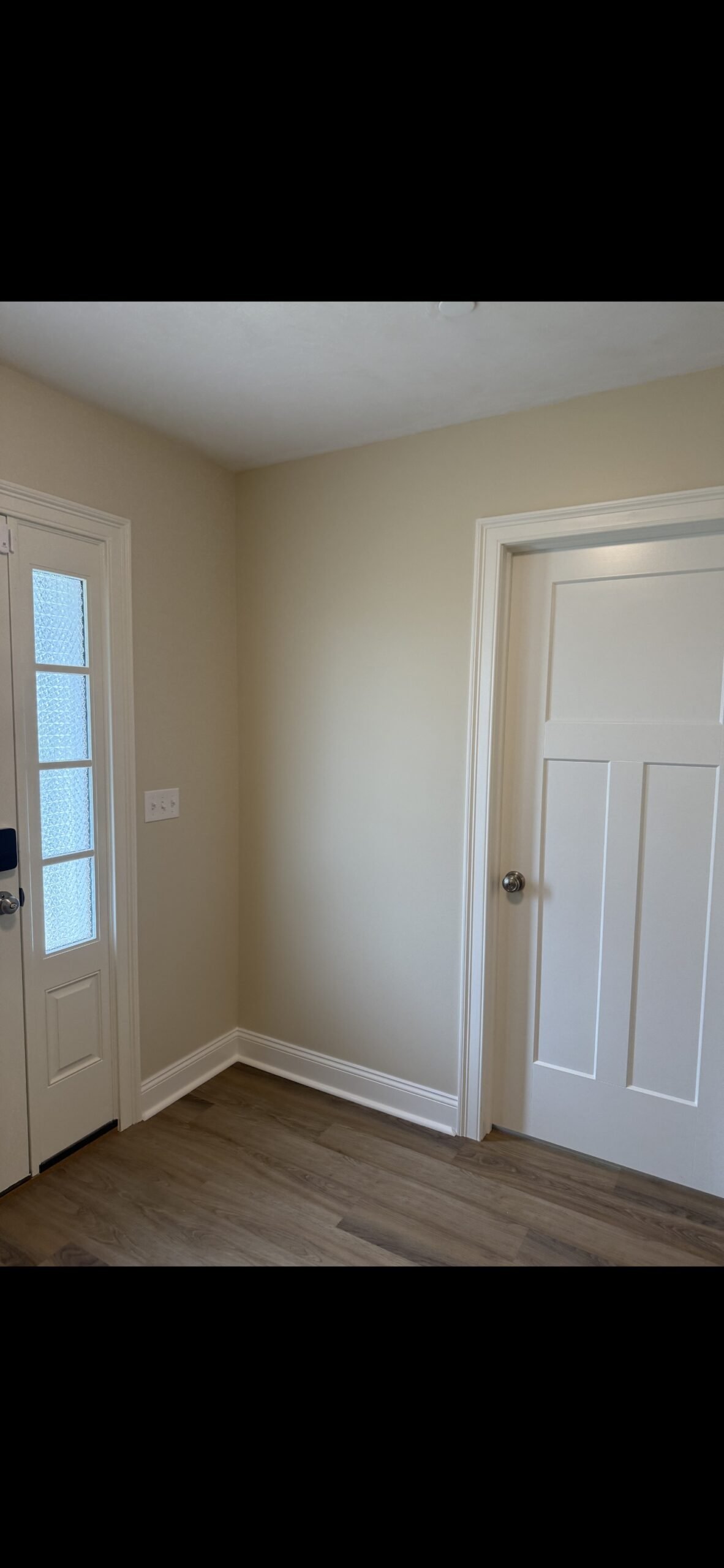 Finished interior wall and door detail in Wilmington guest bedroom conversion
